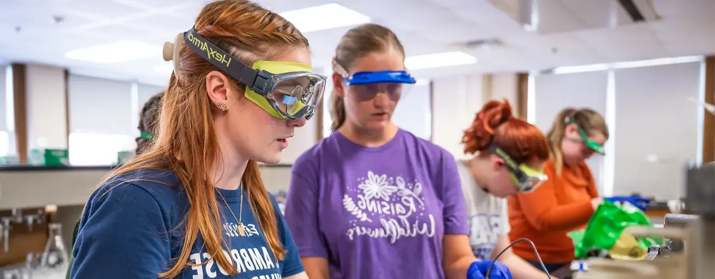 Students conducting experiments in a chemistry lab.