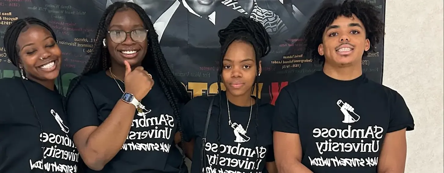 Four members of Black Student Union posing for the camera